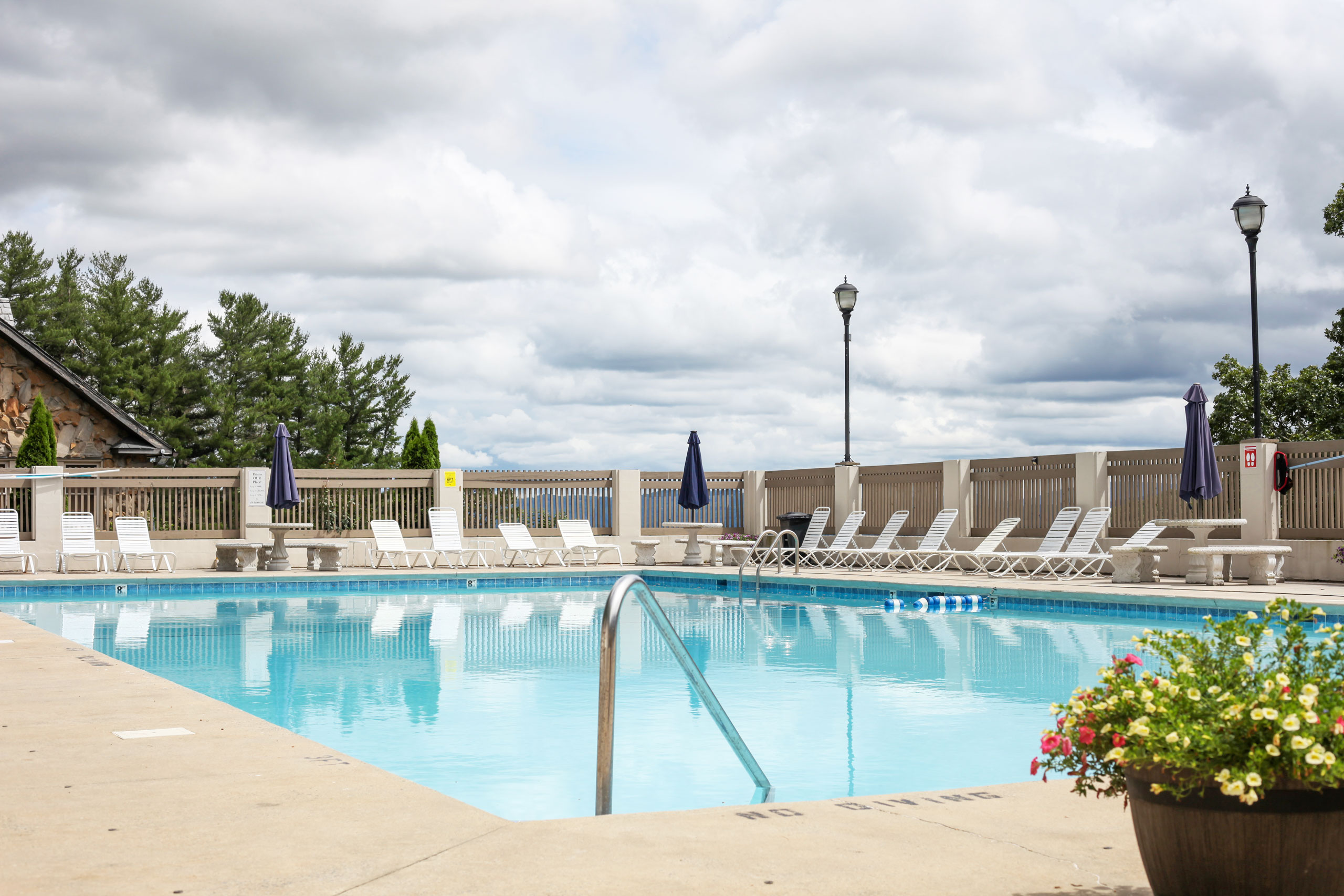 Empty pool deck for an HOA or apartment pool